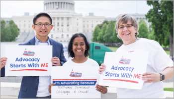 Three adults holding signs advocating for telehealth