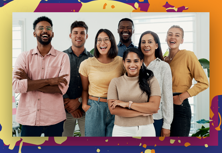 A group of young people of varying genders and races smiling.
